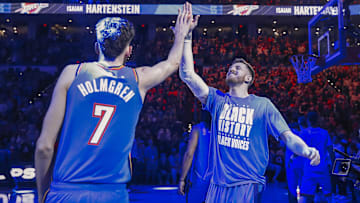Feb 7, 2025; Oklahoma City, Oklahoma, USA; Oklahoma City Thunder center Isaiah Hartenstein (55) high fives forward Chet Holmgren (7) during introductions before the start of a game against the Toronto Raptors during the second half at Paycom Center. Mandatory Credit: Alonzo Adams-Imagn Images