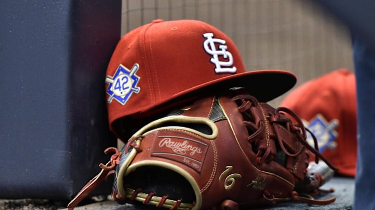 Apr 15, 2019; Milwaukee, WI, USA; A cap rests on the dug out wall with the number 42 on the hat in