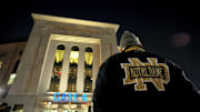 Nov. 20, 2010; New York, NY, USA; A Notre Dame fan waits outside Yankee Stadium before the game between the Notre Dame Fighting Irish and the Army Black Knights. 