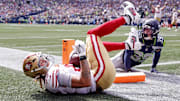 Sep 7, 2025; Seattle, Washington, USA; San Francisco 49ers tight end George Kittle (85) celebrates after scoring a touchdown during the first half against the Seattle Seahawks during the first quarter at Lumen Field. Mandatory Credit: Joe Nicholson-Imagn Images