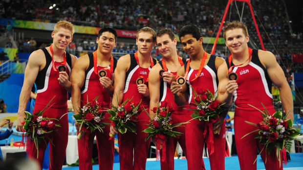 United States gymnasts (from left) Justin Spring , Kai Wen Tan , Alexander Artemev , Joey Hagerty , Raj Bhavsar and Jonathan 