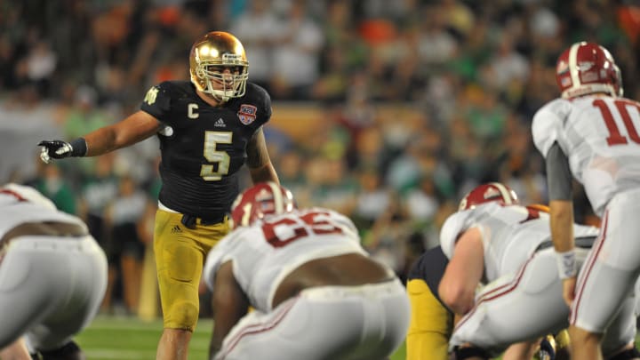 Jan 7, 2013; Miami, FL, USA; Notre Dame Fighting Irish linebacker Manti Te'o (5) in action during the second half of the 2013 BCS Championship game against the Alabama Crimson Tide at Sun Life Stadium.  Mandatory Credit: Matt Cashore-USA TODAY Sports