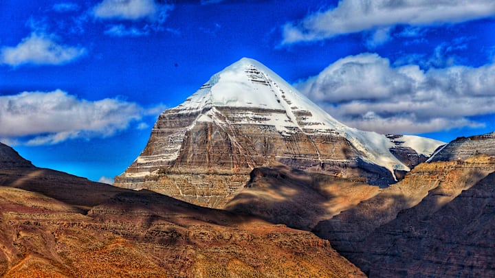 Tibet's Mount Kailash against a blue sky