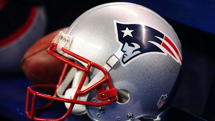 Feb 5, 2012; Indianapolis, IN, USA; Detail view of the New England Patriots helmet on the bench before Super Bowl XLVI against the New York Giants at Lucas Oil Stadium.  Mandatory Credit: Mark J. Rebilas-Imagn Images