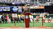 Seattle Mariners former starting pitcher Randy Johnson talks to the fans during a ceremony in which Johnson is inducted into the Seattle Mariners hall of fame prior to the game between the Seattle Mariners and the Kansas City Royals at Safeco Field. 