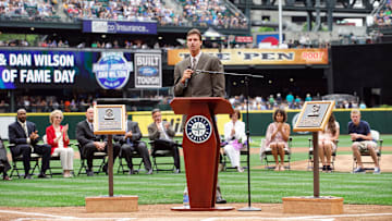 Seattle Mariners former starting pitcher Randy Johnson talks to the fans during a ceremony in which Johnson is inducted into the Seattle Mariners hall of fame prior to the game between the Seattle Mariners and the Kansas City Royals at Safeco Field. 