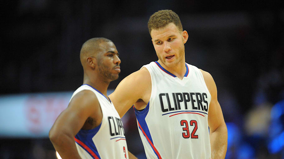 Los Angeles Clippers forward Blake Griffin speaks with guard Chris Paul against the Phoenix Suns.