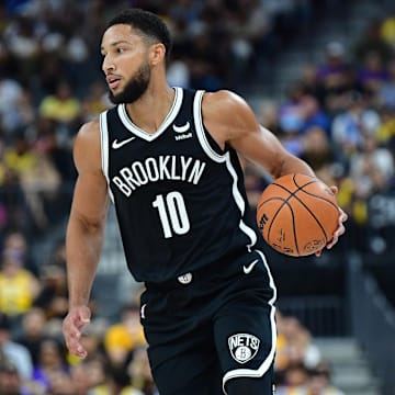 Oct 9, 2023; Las Vegas, Nevada, USA; Brooklyn Nets guard Ben Simmons (10) moves the ball up court against the Los Angeles Lakers during the first half at T-Mobile Arena. Mandatory Credit: Gary A. Vasquez-Imagn Images