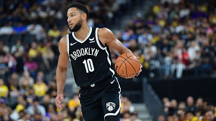 Oct 9, 2023; Las Vegas, Nevada, USA; Brooklyn Nets guard Ben Simmons (10) moves the ball up court against the Los Angeles Lakers during the first half at T-Mobile Arena. Mandatory Credit: Gary A. Vasquez-Imagn Images