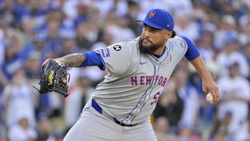 Los Angeles, California, USA; New York Mets pitcher Sean Manaea (59) pitches against the Los Angeles Dodgers in the first inning during Game 6 of the NLCS for the 2024 MLB playoffs at Dodger Stadium.