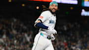 Seattle Mariners shortstop J.P. Crawford runs after hitting a walk-off single against the New York Yankees on May 13 at T-Mobile Park.
