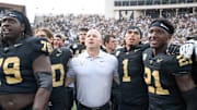 Oct 18, 2025; Nashville, Tennessee, USA;  Vanderbilt Commodores head coach Clark Lea celebrates the win with his team and the student section against the Louisiana State Tigers during the second half at FirstBank Stadium. Mandatory Credit: Steve Roberts-Imagn Images