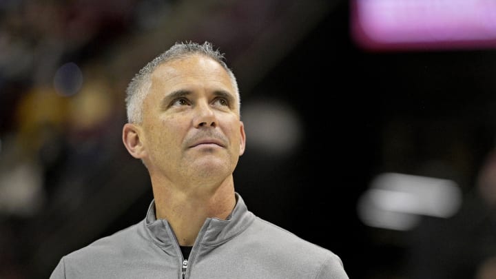 Mar 9, 2024; Tallahassee, Florida, USA; Florida State Seminoles head football coach Mike Norvell accepts the Bear Bryant coach of the Year award during a media timeout of a basketball game against the Miami Hurricanes at Donald L. Tucker Center. Mandatory Credit: Melina Myers-USA TODAY Sports