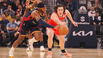 Jan 23, 2025; San Francisco, California, USA; Golden State Warriors guard Buddy Hield (7) steals the ball from Chicago Bulls guard Josh Giddey (3)