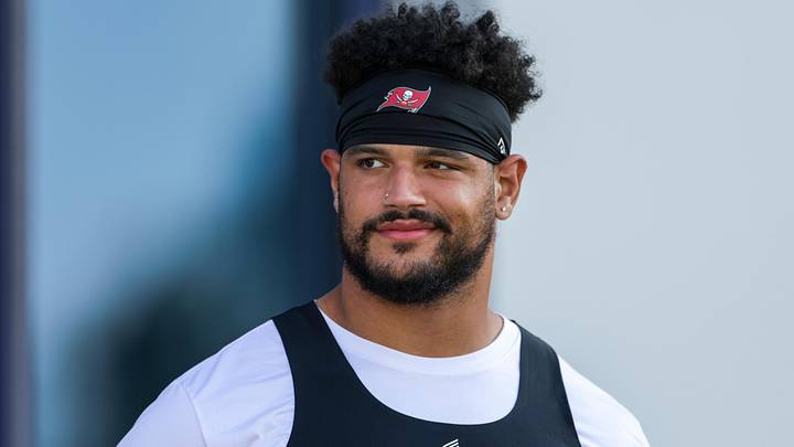 Aug 1, 2025; Tampa, FL, USA; Tampa Bay Buccaneers defensive end Logan Hall (90) looks on before training camp at AdventHealth Training Center. Mandatory Credit: Nathan Ray Seebeck-Imagn Images
