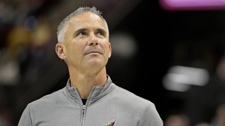 Mar 9, 2024; Tallahassee, Florida, USA; Florida State Seminoles head football coach Mike Norvell accepts the Bear Bryant coach of the Year award during a media timeout of a basketball game against the Miami Hurricanes at Donald L. Tucker Center. Mandatory Credit: Melina Myers-USA TODAY Sports