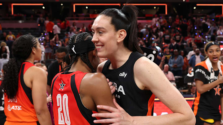 Team Collier forward Breanna Stewart embraces Team Clark guard Brittney Sykes after the 2025 WNBA All Star Game at Gainbridge Fieldhouse. Team Collier forward Breanna Stewart embraces Team Clark guard Brittney Sykes after the 2025 WNBA All Star Game at Gainbridge Fieldhouse.
