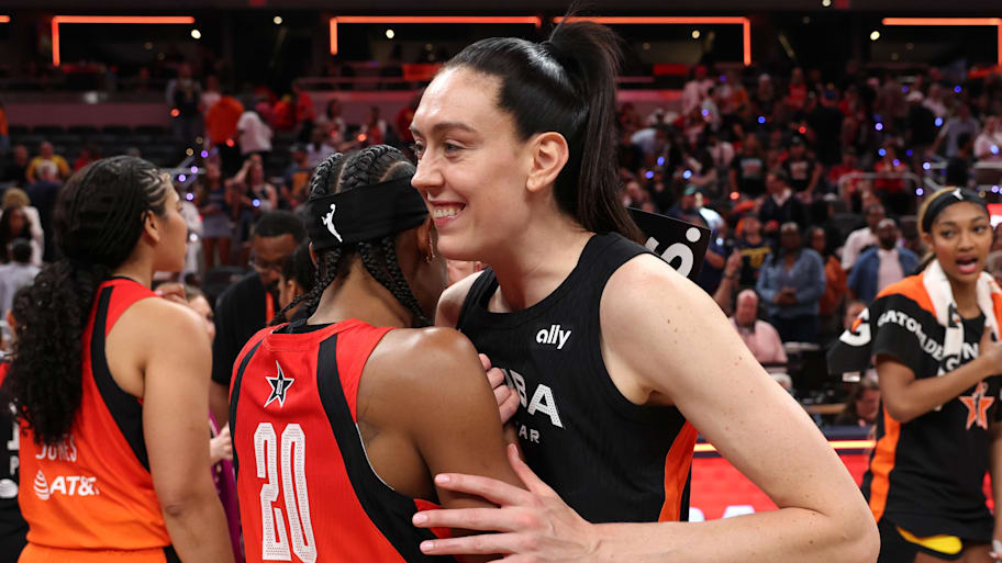 Team Collier forward Breanna Stewart embraces Team Clark guard Brittney Sykes after the 2025 WNBA All Star Game at Gainbridge Fieldhouse. | Trevor Ruszkowski-Imagn Images