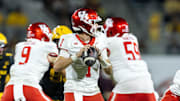 Oct 25, 2025; Tempe, Arizona, USA; Houston Cougars quarterback Conner Weigman (1) against the Arizona State Sun Devils in the second half at Mountain America Stadium. Mandatory Credit: Mark J. Rebilas-Imagn Images