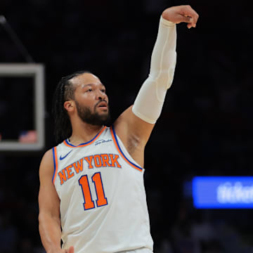Mar 2, 2025; Miami, Florida, USA; New York Knicks guard Jalen Brunson (11) watches his shot against the Miami Heat during the first quarter at Kaseya Center. Mandatory Credit: Sam Navarro-Imagn Images