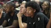 Jul 10, 2025; Las Vegas, NV, USA; San Antonio Spurs guard Dylan Harper (2) looks on from the bench during the fourth quarter of their game against the Philadelphia 76ers  at Thomas & Mack Center.
