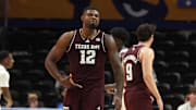 Dec 2, 2025; Pittsburgh, Pennsylvania, USA;  Texas A&M Aggies forward Rashaun Agee (12) reacts after making a three point basket against the Pittsburgh Panthers during the second half at the Petersen Events Center. Mandatory Credit: Charles LeClaire-Imagn Images