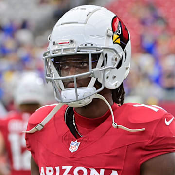 Sep 15, 2024; Glendale, Arizona, USA;  Arizona Cardinals wide receiver Marvin Harrison Jr. (18) prior to a game against the Los Angeles Rams at State Farm Stadium. Mandatory Credit: Matt Kartozian-Imagn Images