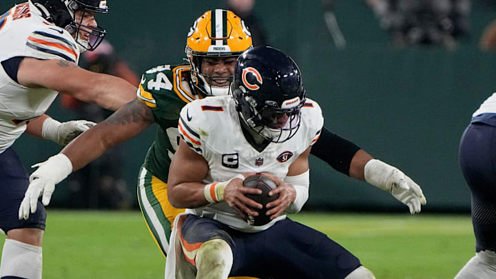 Green Bay Packers defensive end Karl Brooks (94) sacks Chicago Bears quarterback Justin Fields (1)