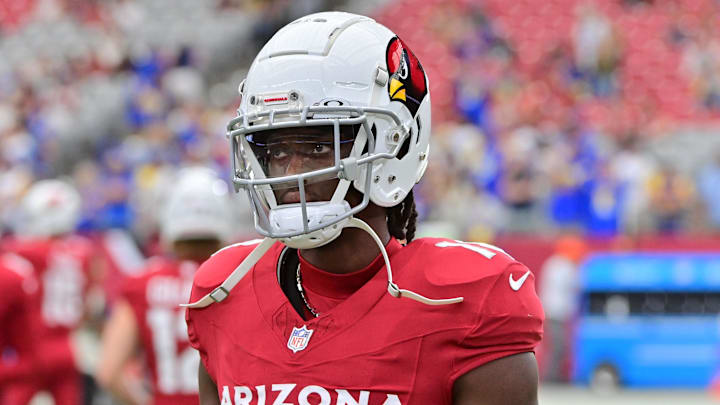 Sep 15, 2024; Glendale, Arizona, USA;  Arizona Cardinals wide receiver Marvin Harrison Jr. (18) prior to a game against the Los Angeles Rams at State Farm Stadium. Mandatory Credit: Matt Kartozian-Imagn Images