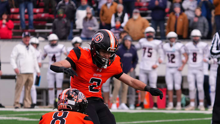 Grafton's Graysen Bollech (2) kicks the go-ahead field goal in the WIAA Division 3 state football championship game against Reedsburg at Camp Randall Stadium in Madison on Friday, Nov. 21, 2025. Grafton won the game, 17-15.