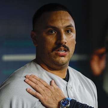 May 30, 2023; Seattle, Washington, USA; New York Yankees manager Aaron Boone (17, right) talks with starting pitcher Nestor Cortes (65) following the fifth inning against the Seattle Mariners at T-Mobile Park. Mandatory Credit: Joe Nicholson-Imagn Images