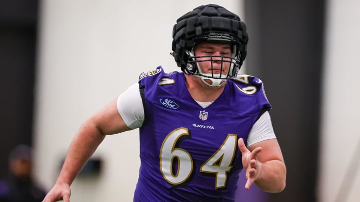 May 7, 2022; Owings Mills, MD, USA; Baltimore Ravens center Tyler Linderbaum (64) in action during rookie minicamp at Under Armour Performance Center. Mandatory Credit: Scott Taetsch-USA TODAY Sports