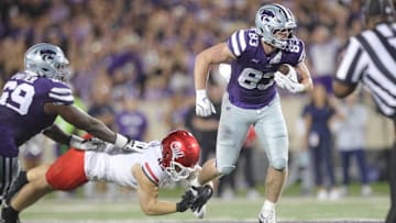 Kansas State Wildcats tight end Will Swanson (83) looks for yards on a play during the third quarter of the game against Arizona at Bill Snyder Family Stadium on Friday, September 13, 2024.