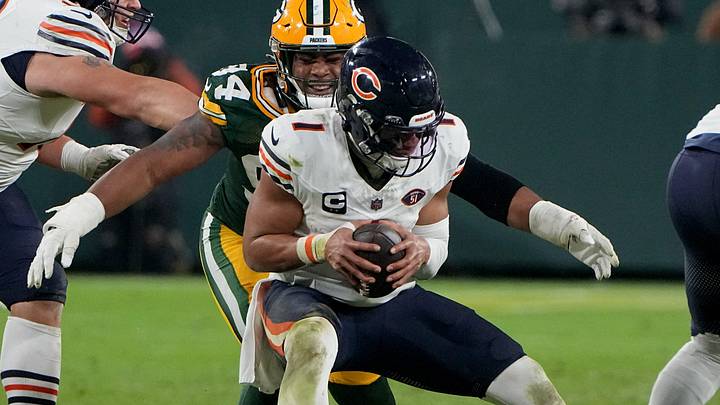 Green Bay Packers defensive end Karl Brooks (94) sacks Chicago Bears quarterback Justin Fields (1) during the fourth quarter of their game Sunday, January 7, 2024 at Lambeau Field in Green Bay, Wisconsin. The Green Bay Packers beat the Chicago Bears 17-9.