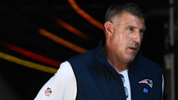 Sep 28, 2025; Foxborough, Massachusetts, USA; New England Patriots head coach  Mike Vrabel runs onto the field before a game against the Carolina Panthers at Gillette Stadium. Mandatory Credit: Brian Fluharty-Imagn Images
