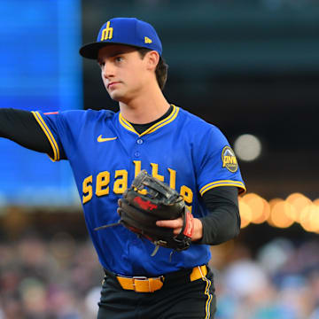 Seattle Mariners second baseman Cole Young throws to first base during a game against the Kansas City Royals on July 3 at T-Mobile Park.