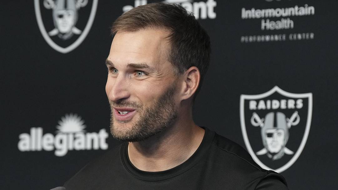 Las Vegas Raiders quarterback Kirk Cousins speaks at a press conference.
