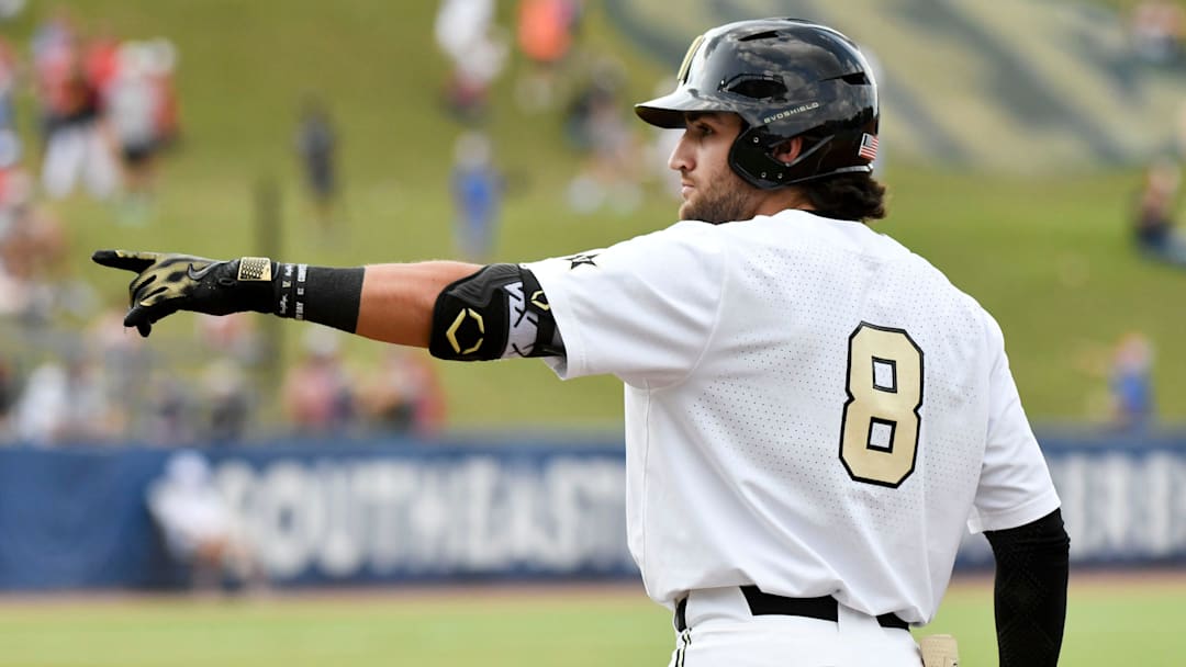 Vanderbilt batter Chris Maldonado points to the dugout after singling home a run against Florida Saturday, May 27, 2023, at the Hoover Met in the semifinal round.