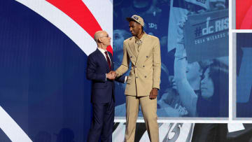 Jun 26, 2024; Brooklyn, NY, USA; Alexandre Sarr shakes hands with NBA commissioner Adam Silver after being selected second overall by the Washington Wizards in the first round in the 2024 NBA Draft at Barclays Center. Mandatory Credit: Brad Penner-USA TODAY Sports