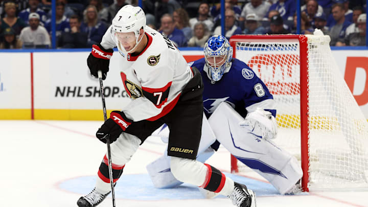 Oct 9, 2025; Tampa, Florida, USA; Ottawa Senators left wing Brady Tkachuk (7) skates with the puck in front of Tampa Bay Lightning goaltender Andrei Vasilevskiy (88) during the second period at Benchmark International Arena. Mandatory Credit: Kim Klement Neitzel-Imagn Images
