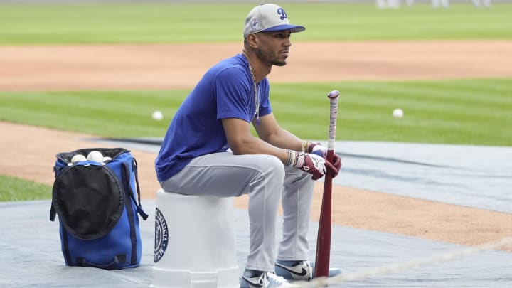 Aug 14, 2024; Milwaukee, Wisconsin, USA; Los Angeles Dodgers shortstop Mookie Betts (50) waits to take battling practice before their game against the Milwaukee Brewers  at American Family Field. Mandatory Credit: Michael McLoone-USA TODAY Sports