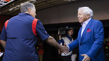 Oct 16, 2022; Cleveland, Ohio, USA; New England Patriots owner Robert Kraft shakes hands with head