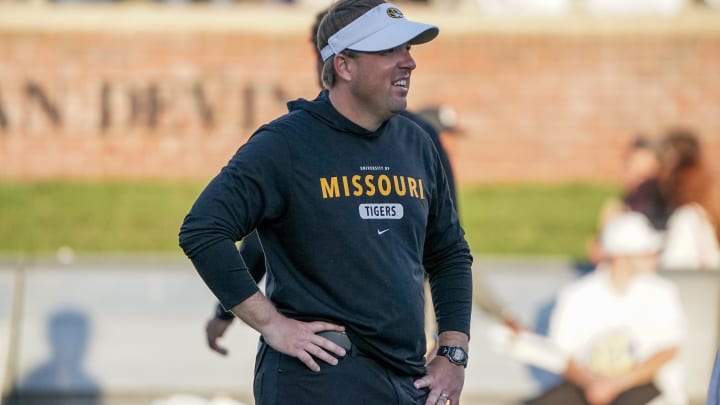 Oct 1, 2022; Columbia, Missouri, USA; Missouri Tigers head coach Eli Drinkwitz watches warm ups against the Georgia Bulldogs prior to a game at Faurot Field at Memorial Stadium. Mandatory Credit: Denny Medley-USA TODAY Sports