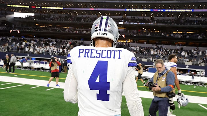 Jan 14, 2024; Arlington, Texas, USA; Dallas Cowboys quarterback Dak Prescott (4) walks off the field after losing in the 2024 NFC wild card game against the Green Bay Packers at AT&T Stadium. Mandatory Credit: Tim Heitman-Imagn Images