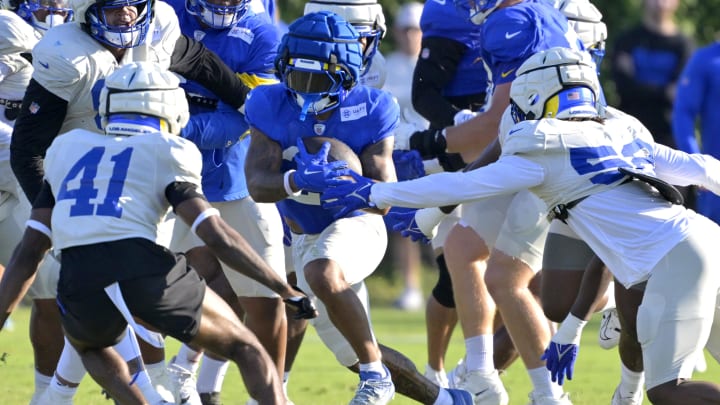 Jul 29, 2024; Los Angeles, CA, USA; Los Los Angeles Rams running back Blake Corum (22) carries the ball during training camp at Loyola Marymount University. Mandatory Credit: Jayne Kamin-Oncea-USA TODAY Sports