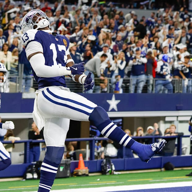 Dallas Cowboys linebacker DeMarvion Overshown celebrates his interception touchdown return against the New York Giants