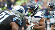 Sep 24, 2023; Seattle, Washington, USA; Seattle Seahawks running back Kenneth Walker III (9) rushes for a touchdown against the Carolina Panthers during the third quarter at Lumen Field. Mandatory Credit: Joe Nicholson-Imagn Images