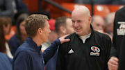 Pacific Tigers head coach Dave Smart (right) talks with Gonzaga Bulldogs head coach Mark Few (left) before the game at Alex G. Spanos Center