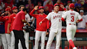 Sep 26, 2025; Anaheim, California, USA; Los Angeles Angels and designated hitter Mike Trout (27) celebrate the victory against the Houston Astros at Angel Stadium. Mandatory Credit: Gary A. Vasquez-Imagn Images