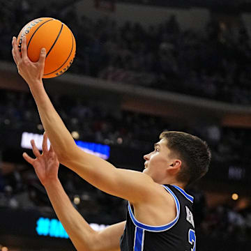 Mar 27, 2025; Newark, NJ, USA; Brigham Young Cougars guard Egor Demin (3) shoots the ball during the second half against the Alabama Crimson Tide during an East Regional semifinal of the 2025 NCAA tournament at Prudential Center. Mandatory Credit: Robert Deutsch-Imagn Images